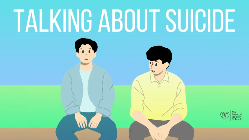 Thumbnail for the blog titled how to talk about suicide. The thumbnail shows a person with blank expression as if in frozen state and there is another person beside him who is trying to talk to him. there is a text behind them for visuals saying - talking about suicide.